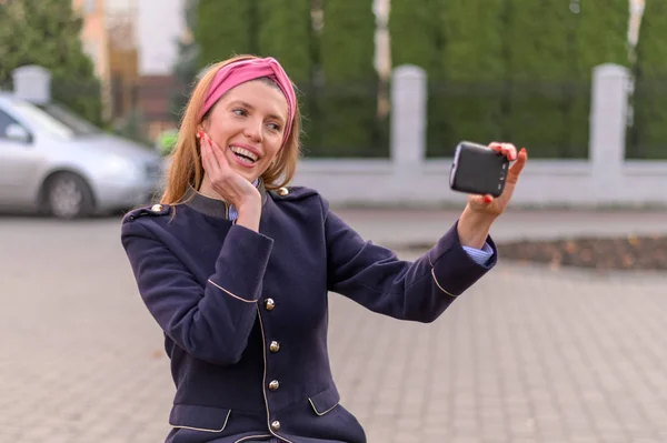 girl blogger records video on the phone