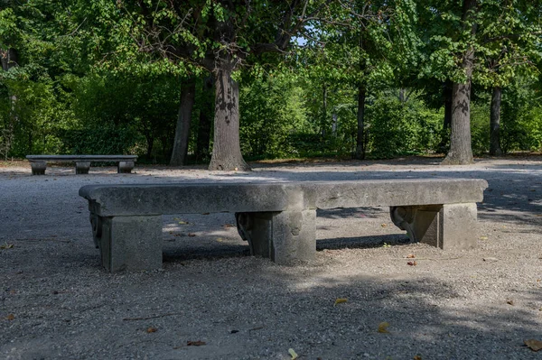 Stone bench in the summer park — Stock Photo, Image