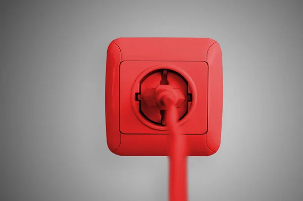 Red electric socket on the wall. Close up. — Stock Photo, Image