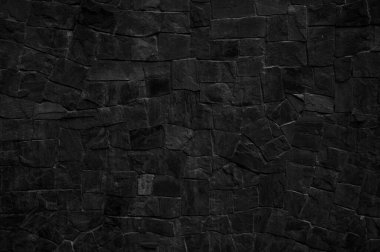 Siyah taş duvar arkaplanı. Çatlak beton arkaplan