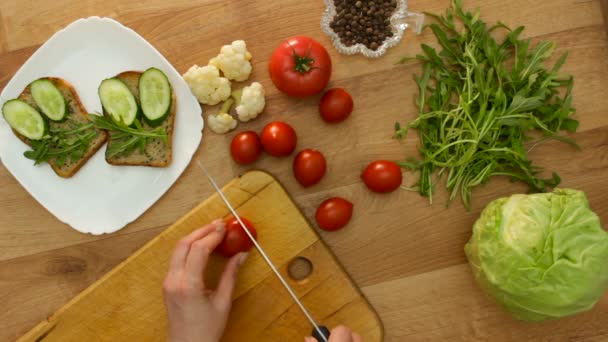 Top View Female Hands Making Sandwich Cucumber Arugula Woman Cuts — Stock Video