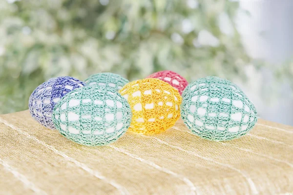Easter eggs are in lacy multi-colored clothes — Stock Photo, Image