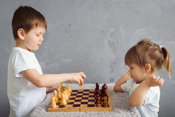 Boy Little Girl Plays Chess While His Room Self Isolation Stock Image