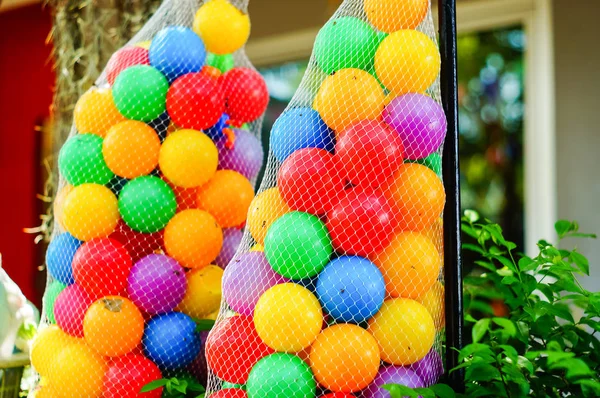 Colorful ball in Mesh bag hanging — Stock Photo, Image