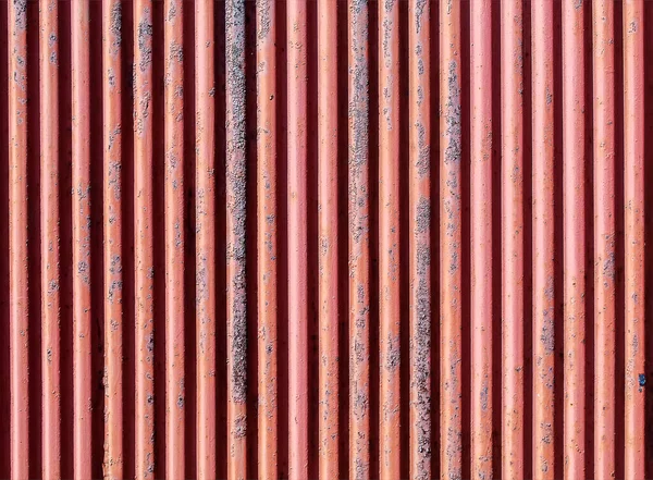 Red Painted Stripped Corrugated Metal Fence