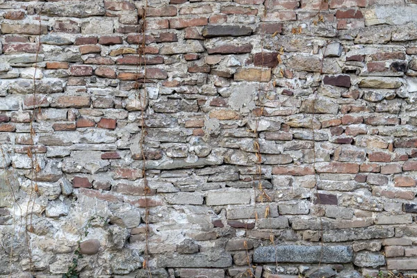 Starý Ošlehaný Kámen Cihlová Zeď — Stock fotografie