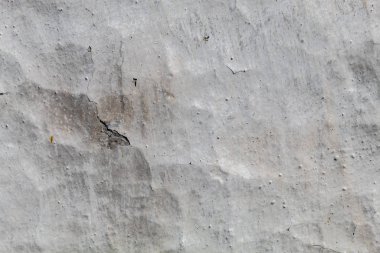 Beyazla boyanmış Eski Çamur Duvarı 'nın çatlak dokusu