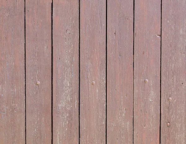 レッドディッシュ古い風化した木製パネル — ストック写真