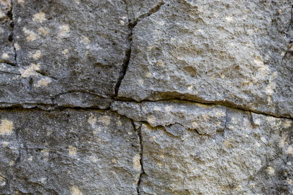 Grijsachtig Oud Verweerd Gebarsten Natuursteen Textuur — Stockfoto