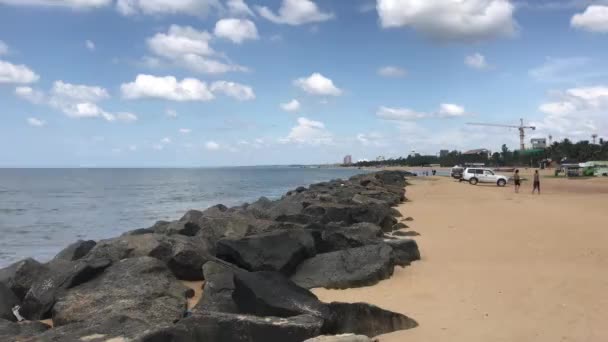 Negombo, Sri Lanka, November 23, 2019, tourists walk along the shore — 비디오