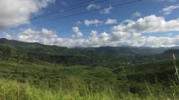 Ella, Sri Lanka, electric poles against the backdrop of green terrain — Stock Video