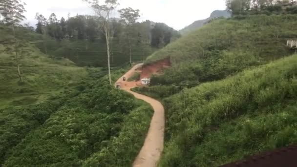 Ella, Sri Lanka, a rural road in a ravine — Stock Video