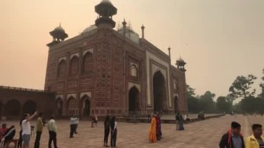 Agra, India, November 10, 2019, Taj Mahal, tourists take a selfie in the background of a mosque