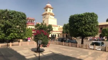 Jaipur, India - November 04, 2019: City Palace large groups of tourists move around the square