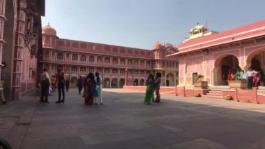 Jaipur, India - November 04, 2019: City Palace and tourists walking along the pink walls part 5