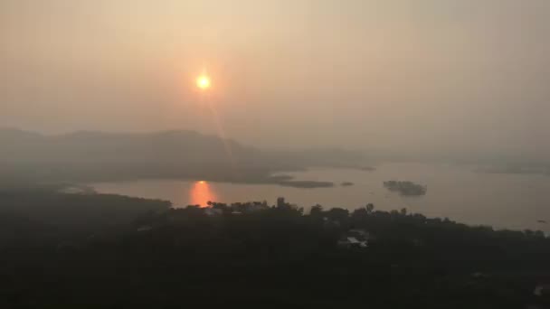 Udaipur, India - sunset over the lake from the top of the mountain part 3 — Stock Video