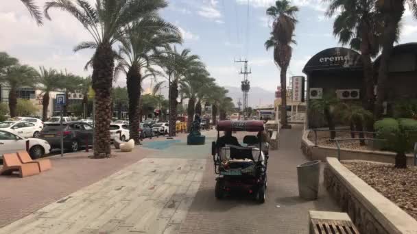 Eilat, Israel - transport moves through the streets of the resort town part 6 — Stockvideo