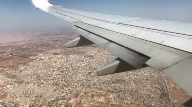 Amman, Jordan - plane flies over the city