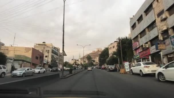 Amman, Jordania - Widok z okna samochodu na ulice miasta część 6 — Wideo stockowe