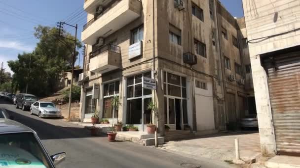 Amman, Jordania - narożny budynek na ulicy — Wideo stockowe