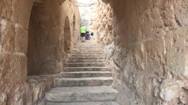 Ajloun, Jordan - October 15, 2019: tourists see the sights of the old fortress