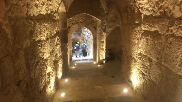 Ajloun, Jordan - October 15, 2019: tourists see the sights of the old fortress part 5 — Stock Video