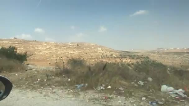 Irbid, Jordania - Vista del coche de la pista de montaña de los alrededores parte 11 — Vídeos de Stock