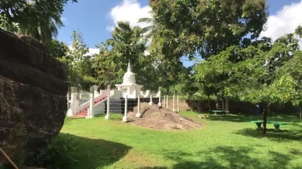 Anuradhapura, Sri Lanka, a small temple in the distance — Stock Video