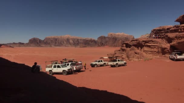 Wadi Rum, Jordan - October 17, 2019: Tourists on holiday after gruelling desert safari part 3 — Stockvideo