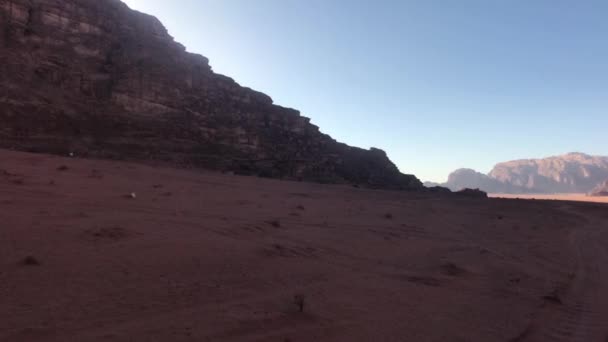 Wadi Rum, Jordan - pink cliffs and red sand in the desert part 5 — 图库视频影像