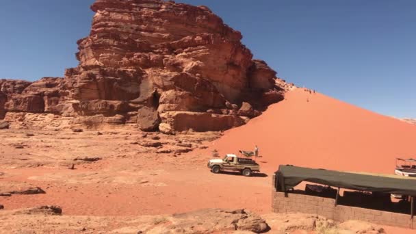 Wadi Rum, Jordan - red sand in the desert against the backdrop of rocky mountains part 19 — Stock Video