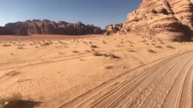 Wadi Rum, Jordan - red sand in the desert against the backdrop of rocky mountains part 6