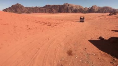Wadi Rum, Jordan - red sand in the desert against the backdrop of rocky mountains part 14