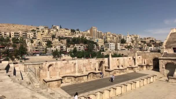 Amman, Jordan - October 20, 2019: Roman Amphitheater tourists walk through the ruins part 11 — Αρχείο Βίντεο