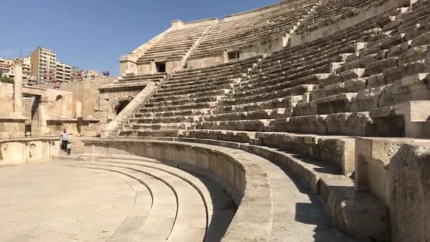 Amman, Jordan - October 20, 2019: Roman Amphitheater tourists walk through the ruins part 9 — Stock video