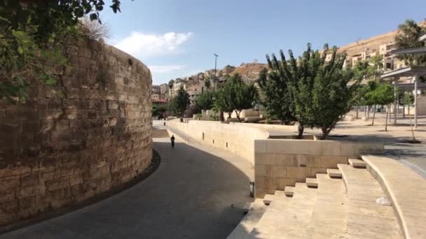 Amman, Jordan - October 20, 2019: Roman Amphitheater tourists walk through the ruins part 19 — Stockvideo