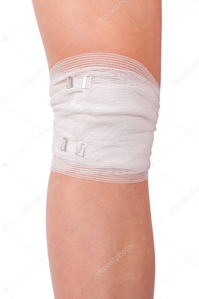 Wounded leg with bandage isolated on white background