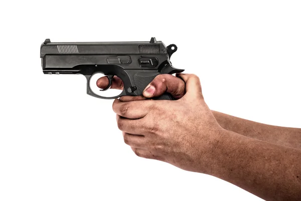 Hand hålla en pistol isolerad på vit bakgrund — Stockfoto