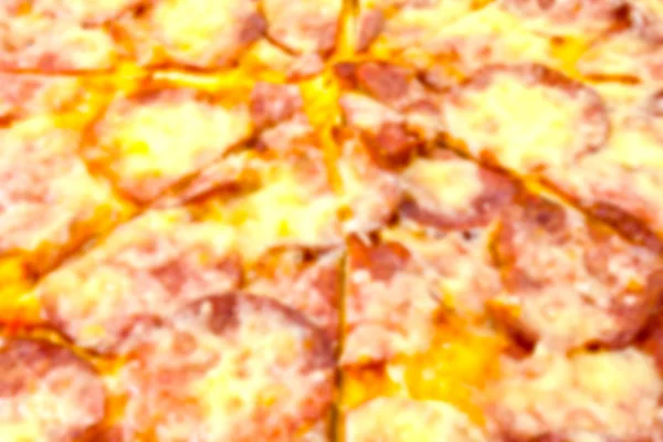 Pizza mit Salami als Hintergrund — Stockfoto