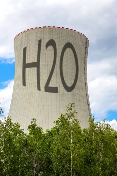 Cooling tower of nuclear power plant with the inscription H2O