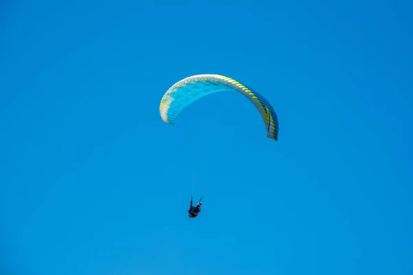 Yellow Paraglider over the Europe Alps mountains — Stock Photo, Image