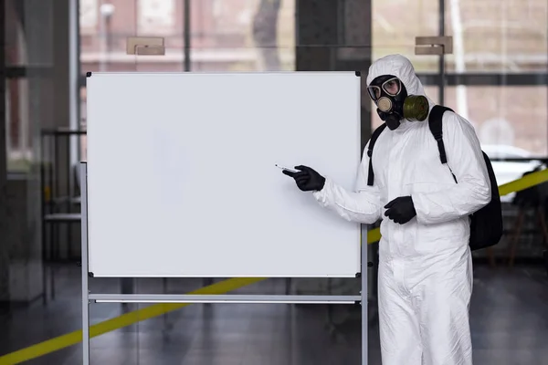 Disinfector Protective Suit Mask Shows Results Work Board Fight Coronovirus — Stock Photo, Image