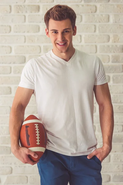 Handsome guy with ball — Stock Photo, Image