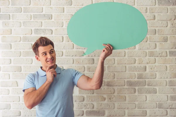 Knappe jongen met tekstballon — Stockfoto