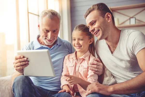 Grandpa, dad and little girl at home — Stock Photo, Image