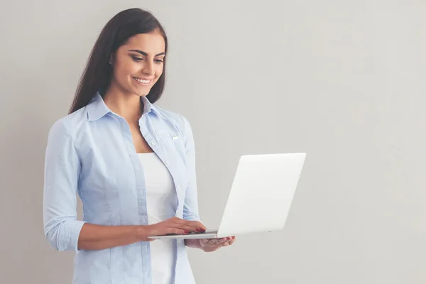 Beautiful business lady with gadget — Stock Photo, Image