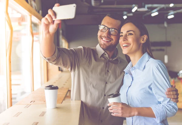 Pareja de negocios trabajando juntos — Foto de Stock