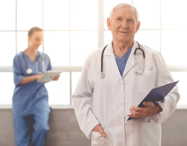 Old and young doctors — Stock Photo, Image