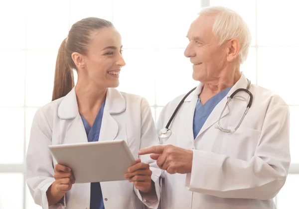 Old and young doctors — Stock Photo, Image