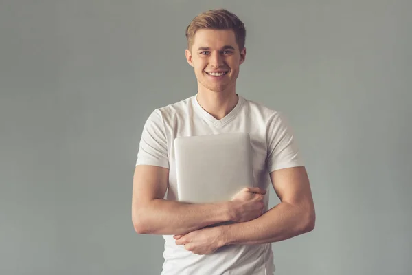 Handsome guy with gadget — Stock Photo, Image